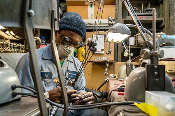 Sam working on parts